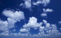 Blue sky with many small clouds Royalty Free Stock Photo