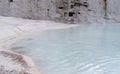 The blue sky mirrored in Natural Pamukkale basins. Denizli province. Turkey