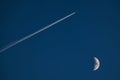 Blue sky with moon and flying airplane Royalty Free Stock Photo