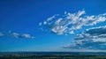 Blue sky and multiple clouds background