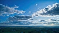 Blue sky and multiple clouds background