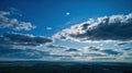 Blue sky and multiple clouds background