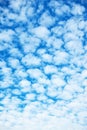 Blue sky with multitude of white clouds