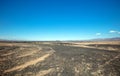 Blue sky over circular tracks in the Mojave desert landscape in California USA