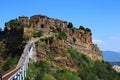 Blue sky over Civita di Bagnoregio, the dying city, captured from a footbridge