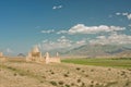 Blue sky over old Muslim graveyard in a mountain village