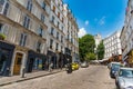 Blue sky over a picturesque street in Montmartre neighborhood Royalty Free Stock Photo