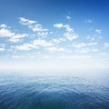 Blue sky over sea or ocean water Royalty Free Stock Photo