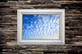 Blue sky picture frame on the granite wall Royalty Free Stock Photo