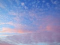 Blue Sky with Pink and Purple clouds Royalty Free Stock Photo