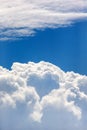 Blue sky with puffy cloud formation in a shape of a heart, natural background Royalty Free Stock Photo
