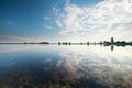 Blue sky reflected in lake Royalty Free Stock Photo