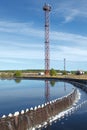 Blue sky reflection in sedimentation tank on treatment plant