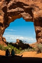 Blue sky through rock arch in Moab, Utah