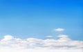 Blue sky with scenic white fluffy cirrus clouds soft focus. Heavenly clouds background summer. Concept of freedom, relaxation.