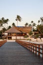 Blue sky and sea beach with palm trees and house Royalty Free Stock Photo