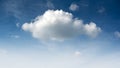 Blue sky and small fluffy single cloud Royalty Free Stock Photo