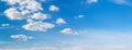 Blue sky with small white cumulus clouds, copy space Royalty Free Stock Photo