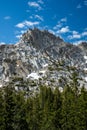 Blue Sky with Soft Clouds Over Ragged Peak in Yosemite