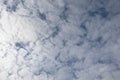 Blue sky with soft puffy clouds, close-up background Royalty Free Stock Photo