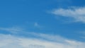 Blue sky soft silky clouds. Background of sky and clouds. Cirrus clouds in blear bright summer day. Time lapse.