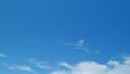Blue sky soft silky clouds. Background of sky and clouds. Cirrus clouds in blear bright summer day. Time lapse. Royalty Free Stock Photo