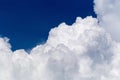 Blue sky with some white puffy clouds. Royalty Free Stock Photo