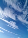 Blue sky with spindrift clouds