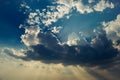 Blue sky with sun beam behind big beautiful cloud Royalty Free Stock Photo