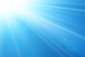 Blue sky sun flare background. Clear summer nature, sunlight weather. Sunshine glare rays, lens. Light sunny spring Royalty Free Stock Photo