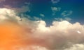 Blue sky with sun, sunbeams and fragmented clouds. Royalty Free Stock Photo