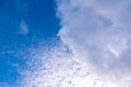 Blue sky in sunny day with white puffy clouds. Natural background Royalty Free Stock Photo