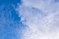 Blue sky in sunny day with white puffy clouds. Natural background Royalty Free Stock Photo
