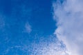 Blue sky in sunny day with white puffy clouds. Natural background Royalty Free Stock Photo