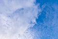 Blue sky in sunny day with white puffy clouds. Natural background Royalty Free Stock Photo