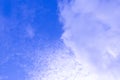 Blue sky in sunny day with white puffy clouds. Natural background Royalty Free Stock Photo