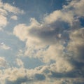 Blue sky with sunny white grey clouds, autumnal heavens