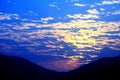 Blue sky and sunset with peacefull cotton clouds Royalty Free Stock Photo