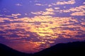 Blue sky and sunset with peacefull cotton clouds Royalty Free Stock Photo