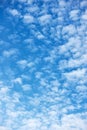 Blue sky with texture of many small white fleecy clouds Royalty Free Stock Photo