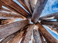 Blue Sky Through Driftwood Teepee Royalty Free Stock Photo