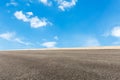 Blue sky white clouds and asphalt road Royalty Free Stock Photo