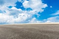 Blue sky white clouds and asphalt road Royalty Free Stock Photo
