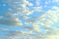 Blue sky and white clouds backlit by the sun