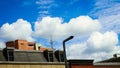 Blue sky and white clouds behind the building 2 Royalty Free Stock Photo