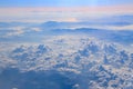 Blue sky with white clouds. Flight over clouds. Celestial abyss