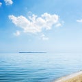 Blue sky with white clouds over sea Royalty Free Stock Photo