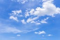 Blue sky with white clouds, rain clouds on sunny summer or spring day for background design Royalty Free Stock Photo