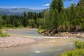 Blue Sky, White Clouds, River Splashing, Flowing Over Rocks. Sunny Summer Day. Ivanovskiy Khrebet Ridge, Altai Mountains, Kazakhst Royalty Free Stock Photo