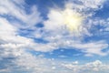 Blue sky with white clouds and sun, sunlight, yellow sun rays Royalty Free Stock Photo